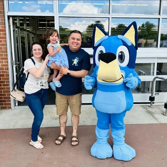 Emily Rieger with her husband and daughter